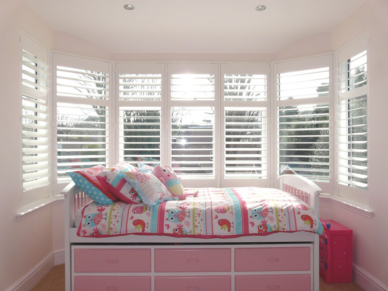 Shuttercraft Northants Pink bedroom bay window shutters
