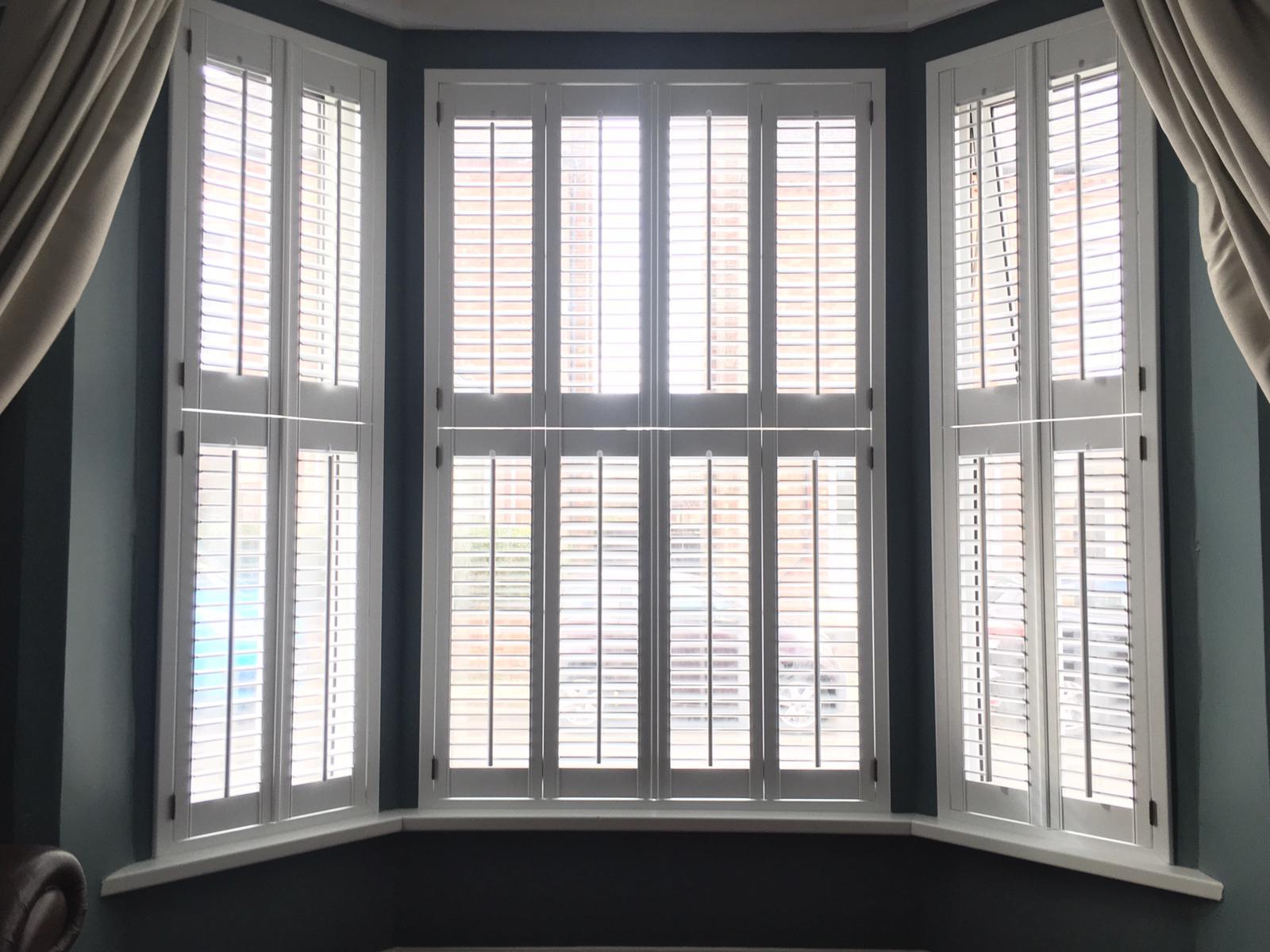 Tier-on-Tier with 47mm louvres and Antique Brass hardware in West Bridgford.