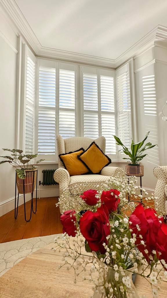 angled bay shutters